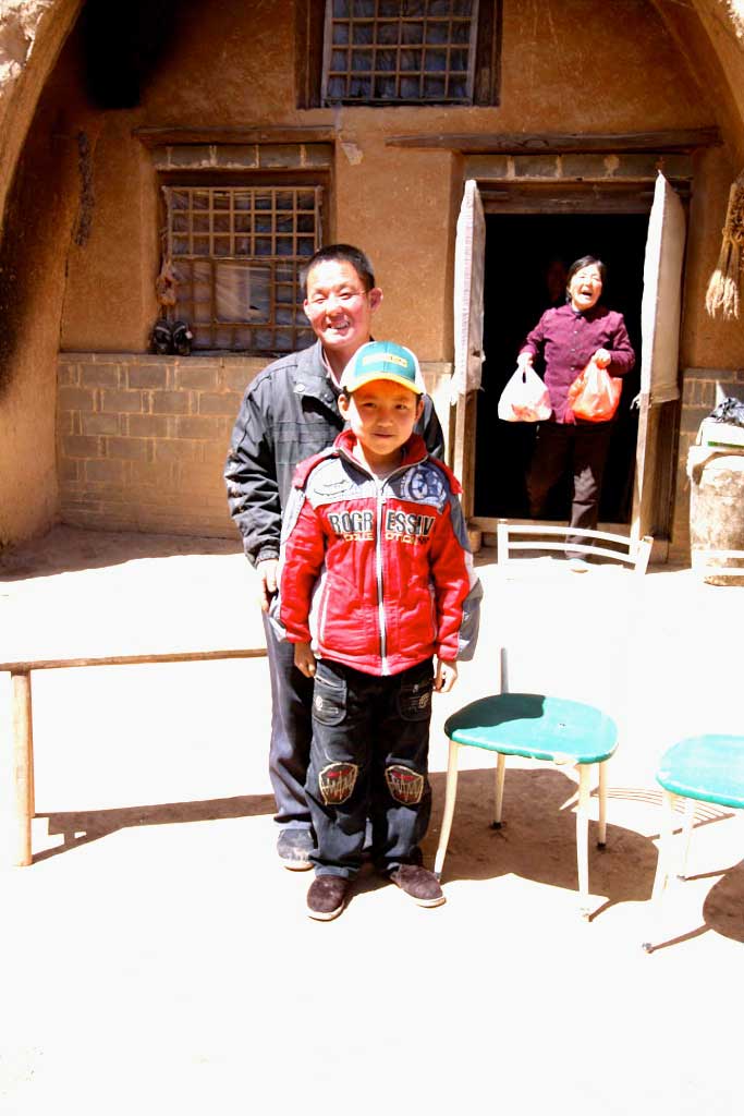 *Yu is in the 4th grade . His mother died during childbirth. Yu’s father is the main breadwinner of the family and has to leave the village to make money. Yu’s grandfather died many years ago and his grandmother lives with her son and grandson.