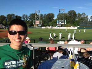 Kyle Witzigman watches the Eugene Emeralds Fourth of July celebration with a fireworks show