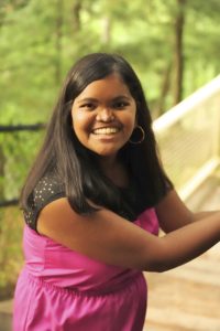 achel in her graduation photo. In high school, she participated in soccer, dance team and cheer squad. 