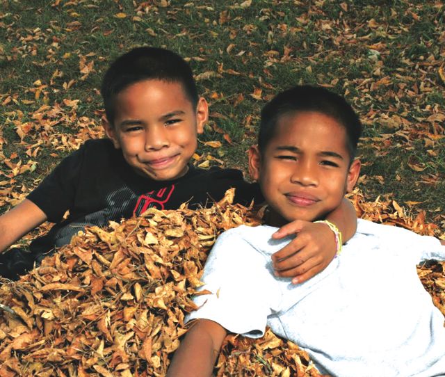  From left: Eli, 10, and Lucas, 11, in fall 2010 — a year after coming home.