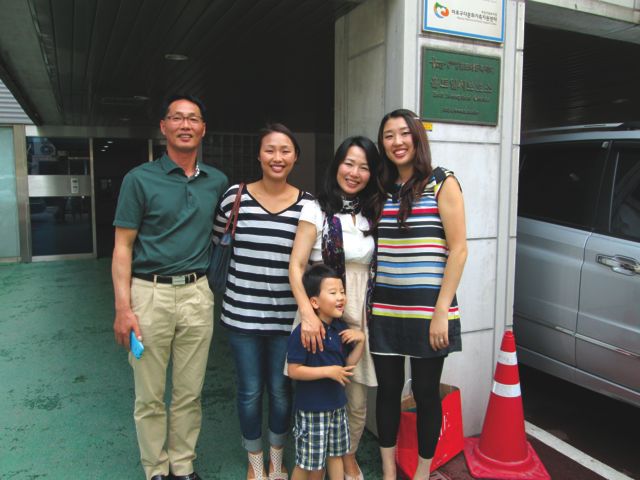 Natalie with her birth family in Seoul, Korea. From left: Natalie’s birth father, birth sister, birth mom with her son, and Natalie. 