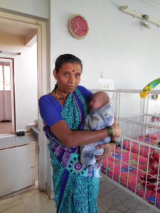 Caregivers at BSSK all wear turquoise sarees so they are easily recognizable to the children in their care.