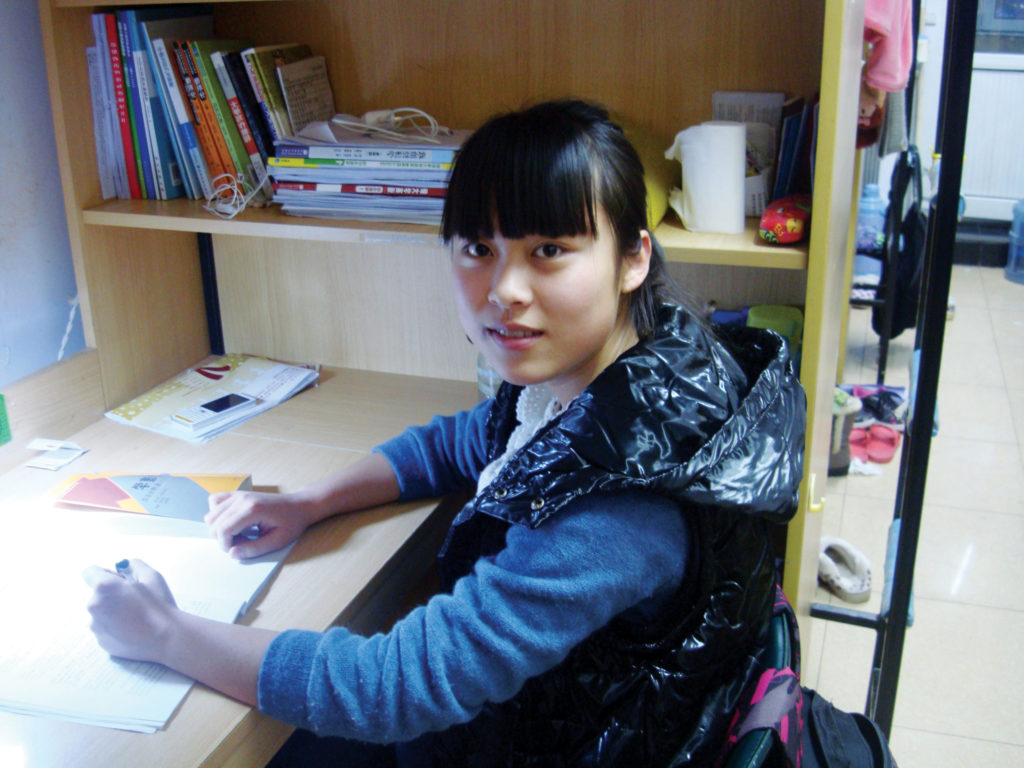 With sponsor support, Fu Yuan, whose parents died when she was young, began her college education in September 2012.
