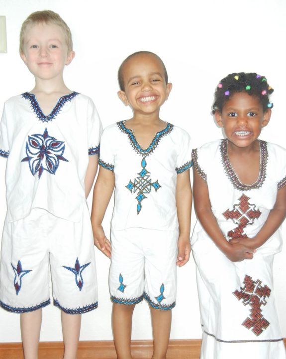 Isaac, Zeri and Kaya in traditional Ethiopian dress. 