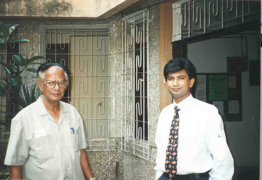 Jim with his father outside of SSG in the late 1990s. 