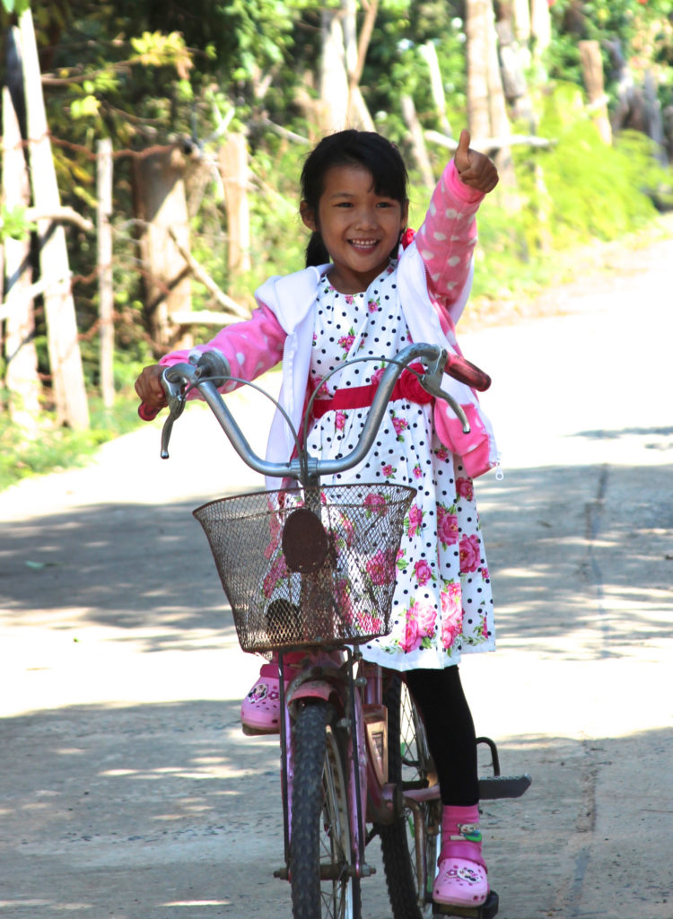 Eden riding a bike.