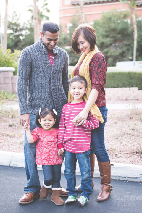 Adoptive parents with their children.