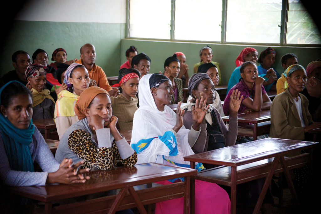 Every Saturday, parents and family members of the students at Yesus Mena also attend sign language class to learn how to communicate with their children.