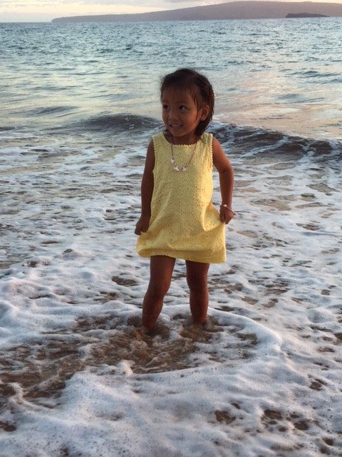 Lucy playing in the ocean.