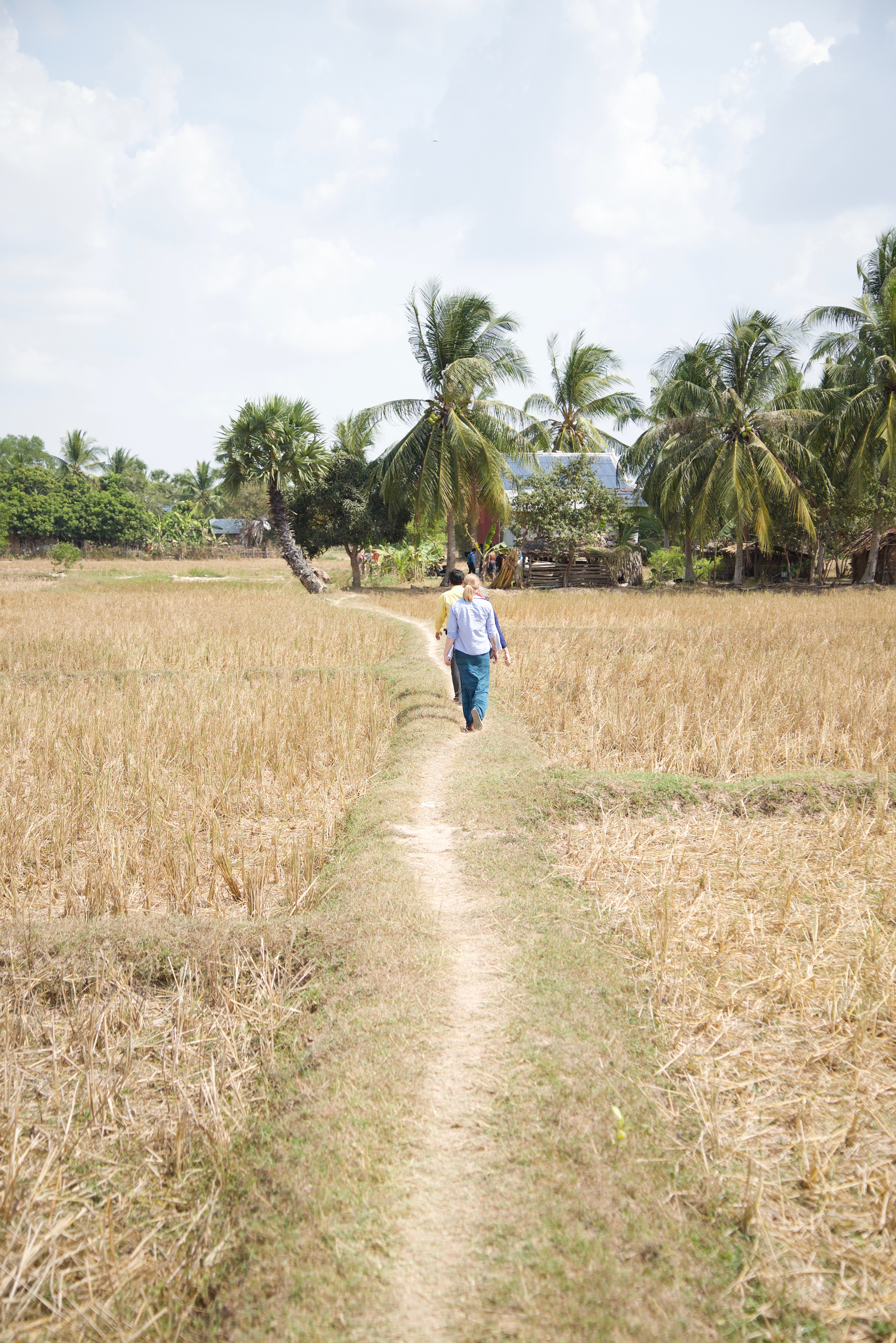 Billie during her trip to Cambodia in 2016, trailing Holt Cambodia staff members as they visit children and families in Holt programs.