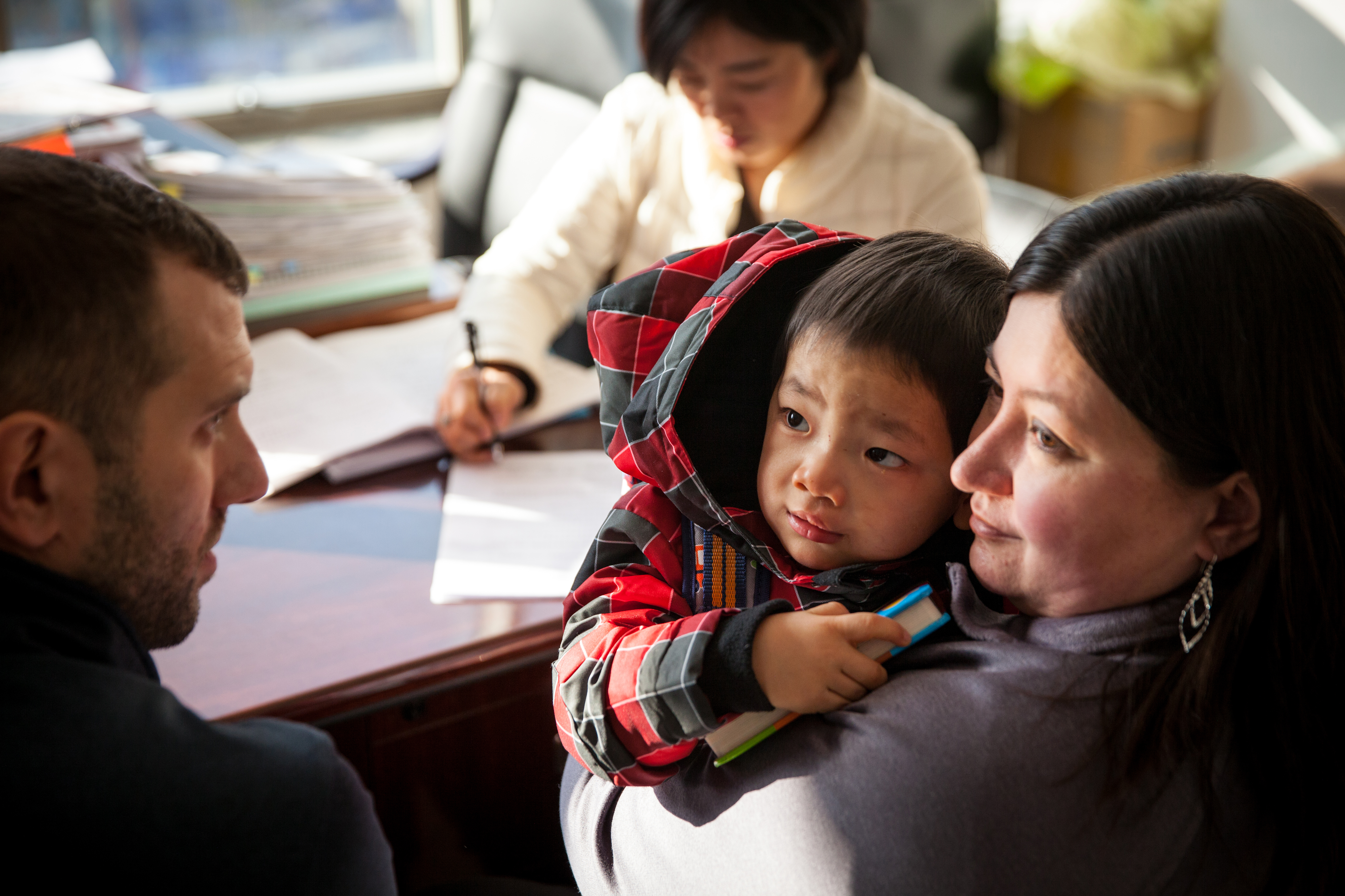 Adam, Stephanie and Landon gooing through the adoption process.