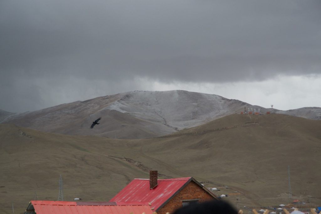 A light dusting of snow covers the hills surrounding Ami-Erdene's home.