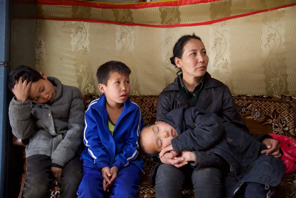 Amin-Erdene’s mom and her children enjoying the comfort of their new ger.