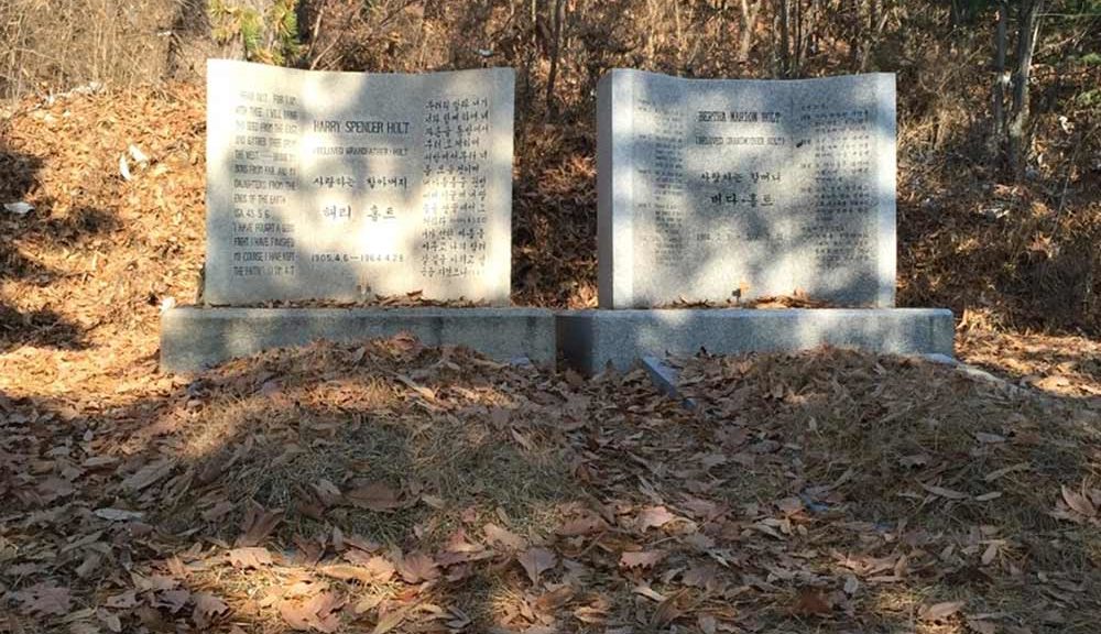 two gravestones in autumn