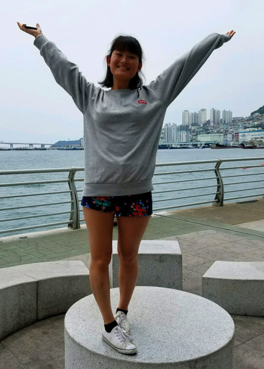 Calli Tilson, standing in Korea on her Holt Family Tour, visiting her birth country and "home"