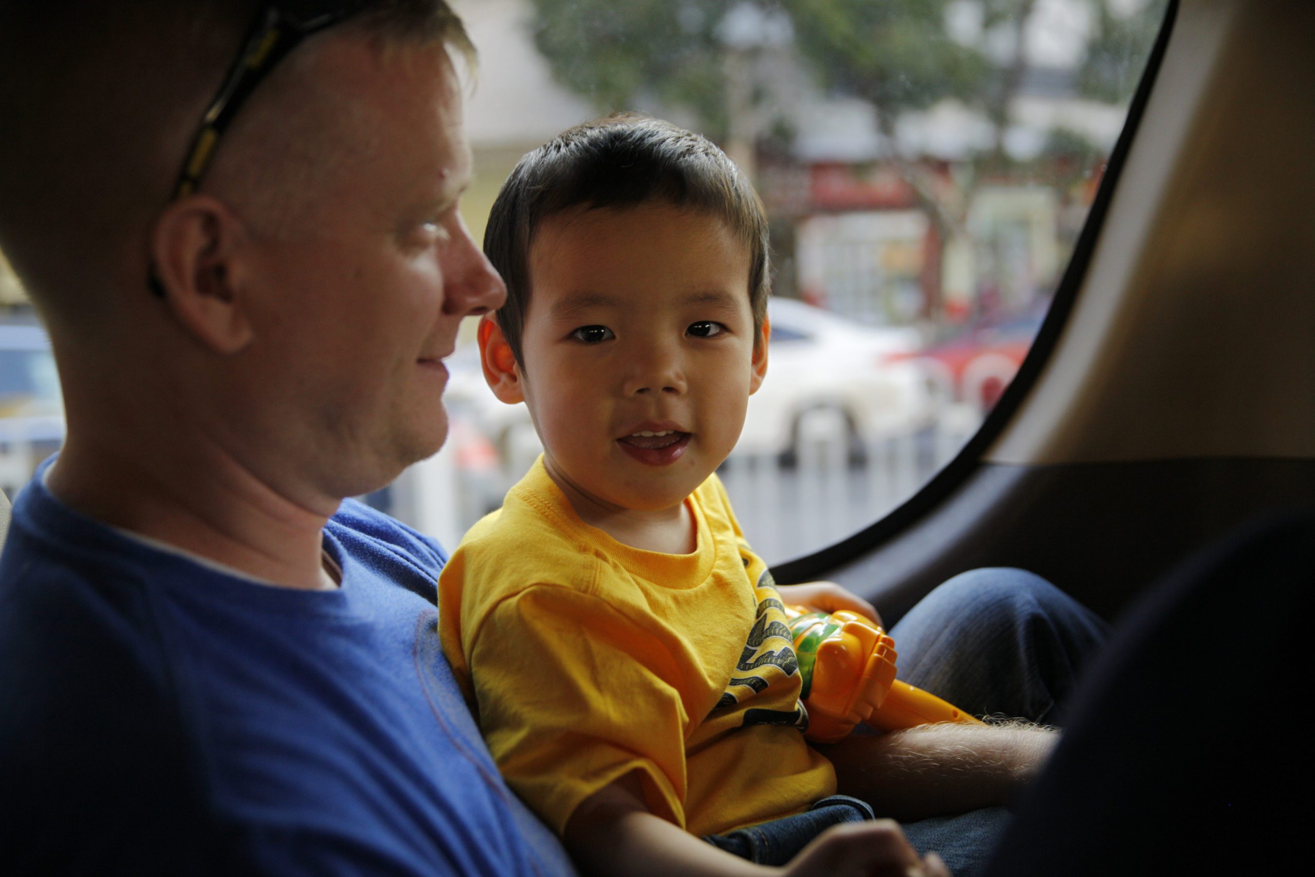 Eric with their son, Kasen, in China. 