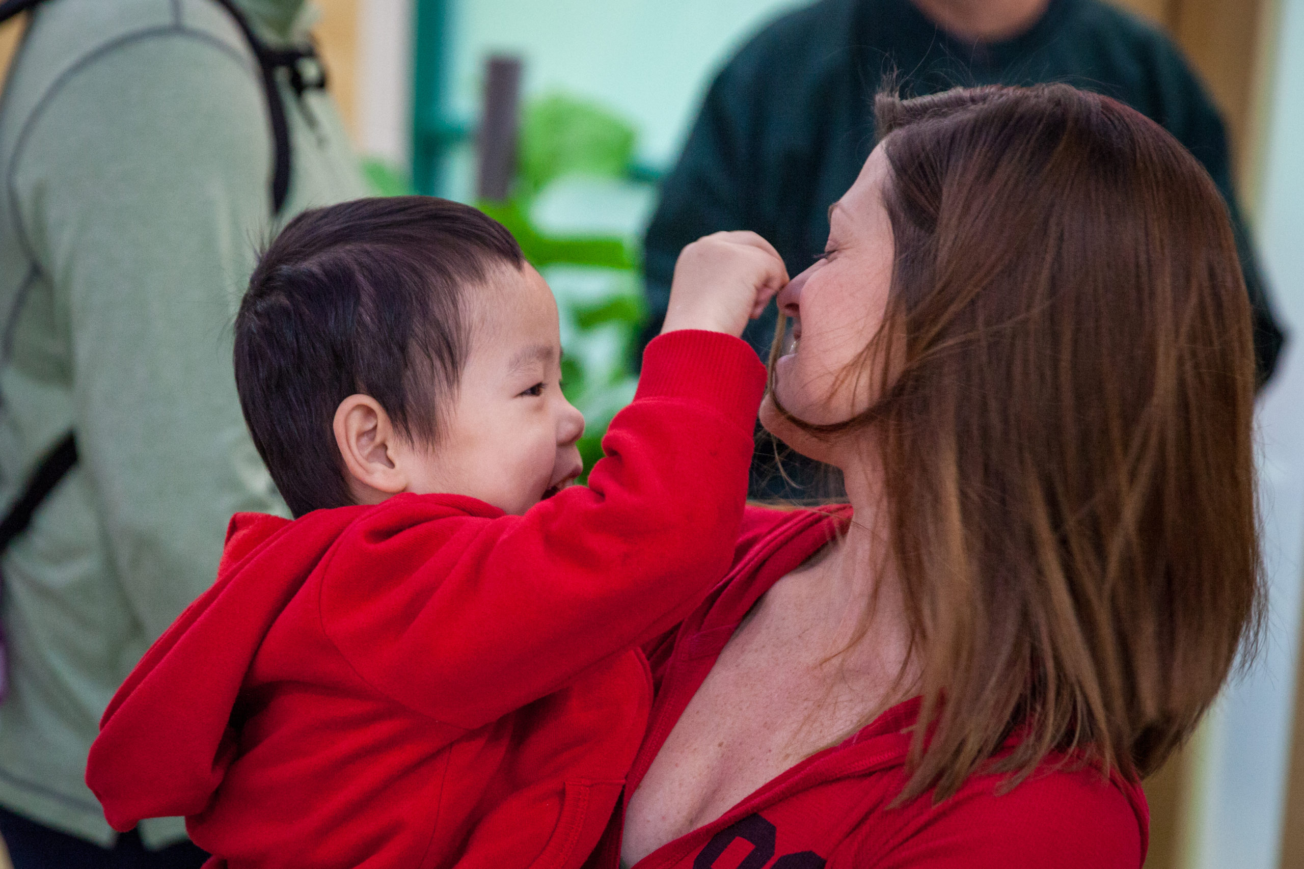 Jen holds Kasen in China. 