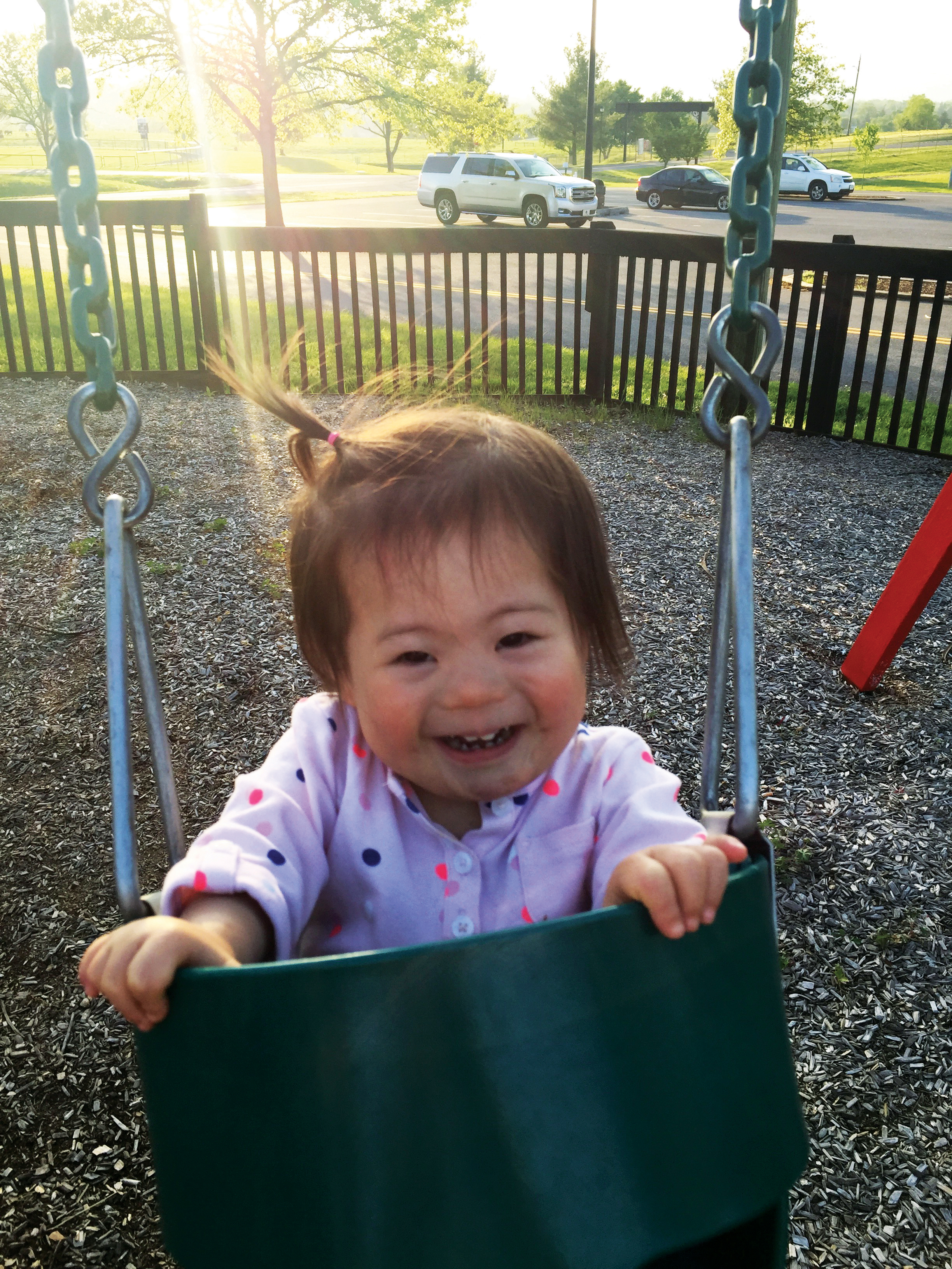Alaina swinging at the park.