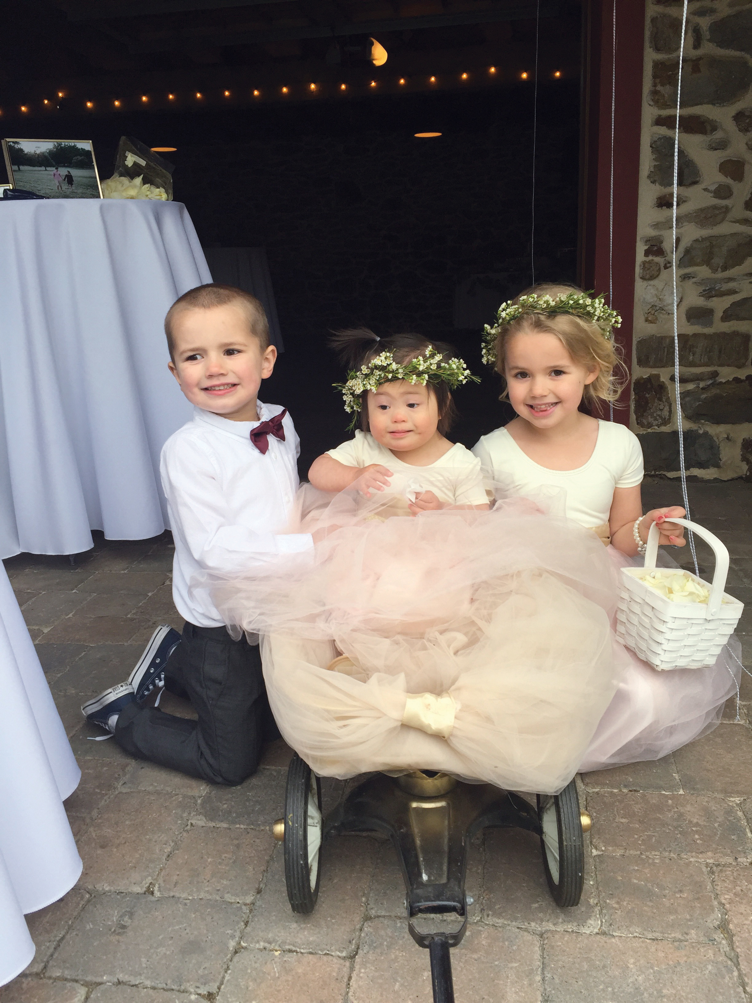 Alaina, Bethany and Lincoln at a wedding.