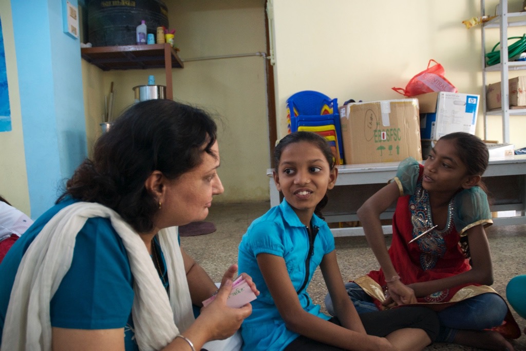 Vaishali chats with one small group during camp at the DEESHA to help end domestic violence.