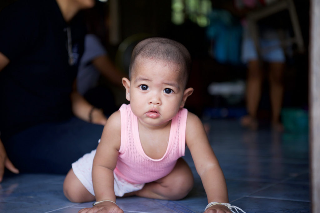 A photo of one of Ping's twin babies. When you sponsor a child in Thailand you help children like him.