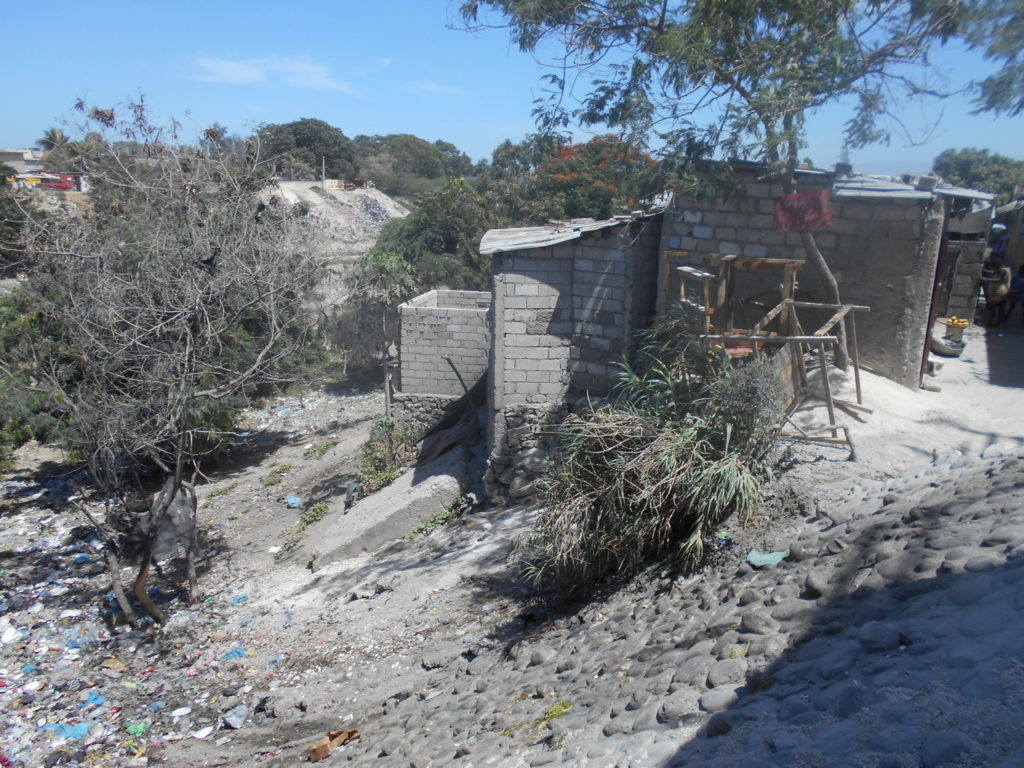 The riverbed area around Johnise and Archelle's one-roomed home.