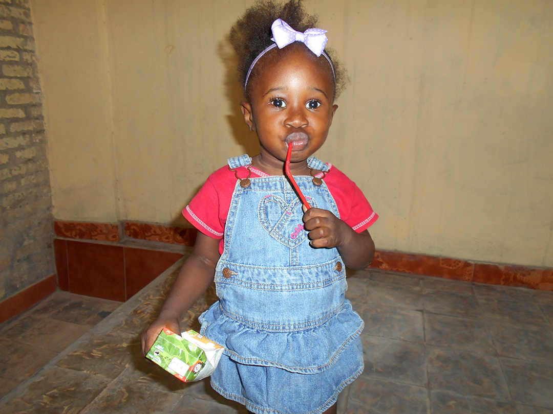 Photo of Archelle. Because of sponsorship gifts she no longer suffers from malnutrition.
