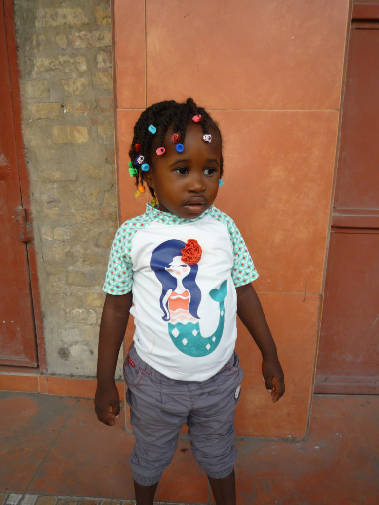 Photo of sponsored child Archelle in September 2017. Sponsorship gifts are helping her receive the nutrition she needs.