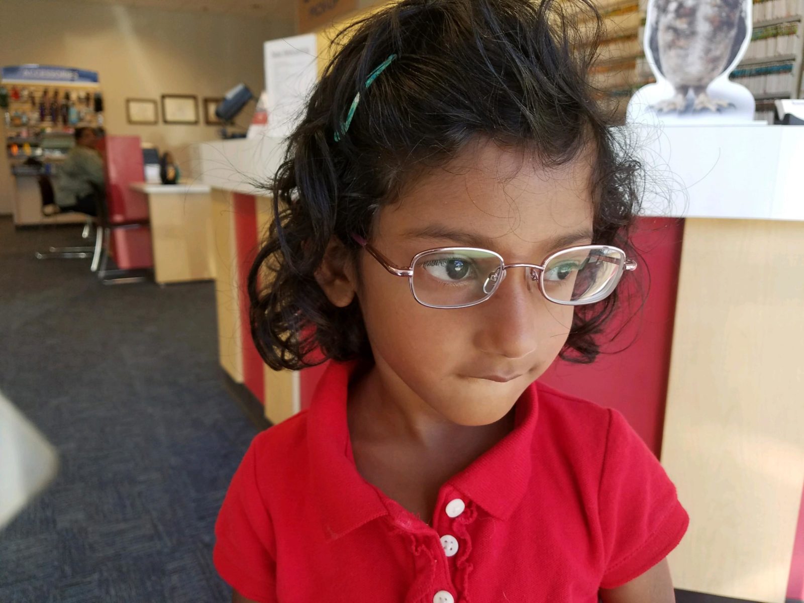 Photo of Devki wearing glasses. Cerebral palsy has affected her vision. Adopting a child with cerebral palsy comes with some challenges but less than you may believe.
