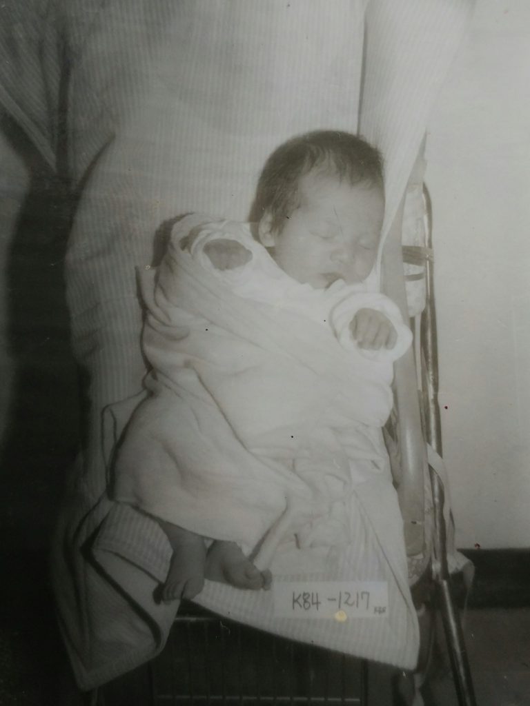 Cat as a baby in Korea before she came home to her parents. This was the first photo they saw of their daughter.
