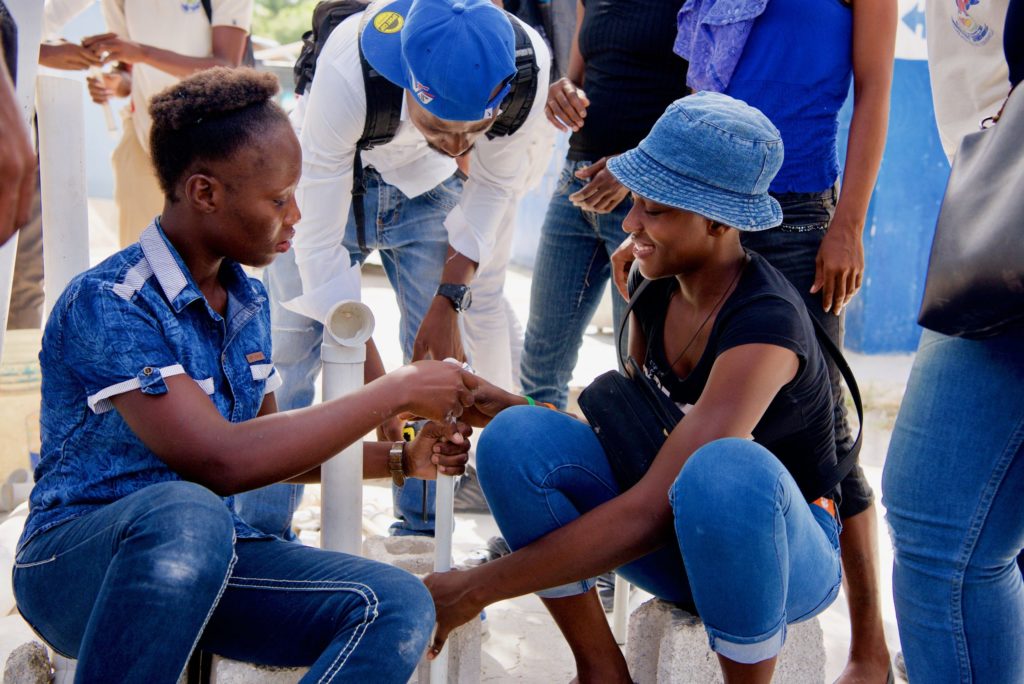 two single mothers in Haiti at job skills training