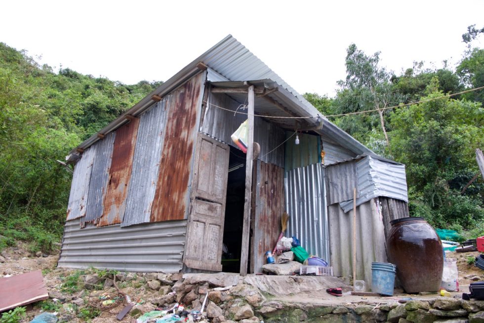 A picture of the one-room shack Linh shares with her seven siblings, her parents and her newborn baby. 