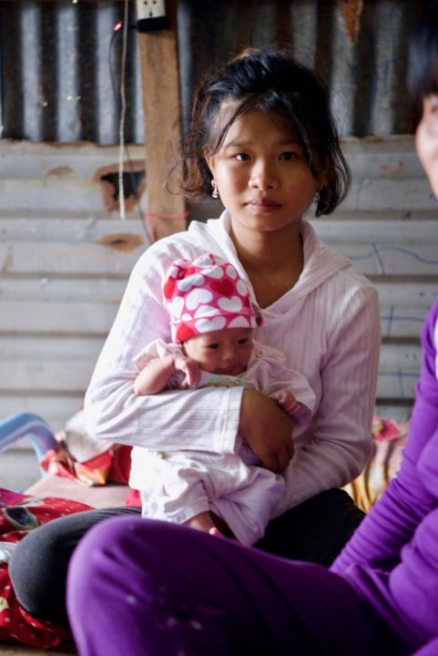 Linh with her baby. 