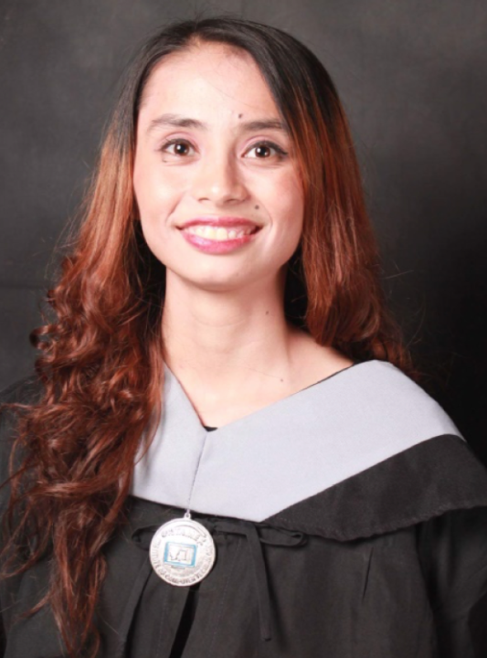 Konny Dela Cruz in her graduation gown. 