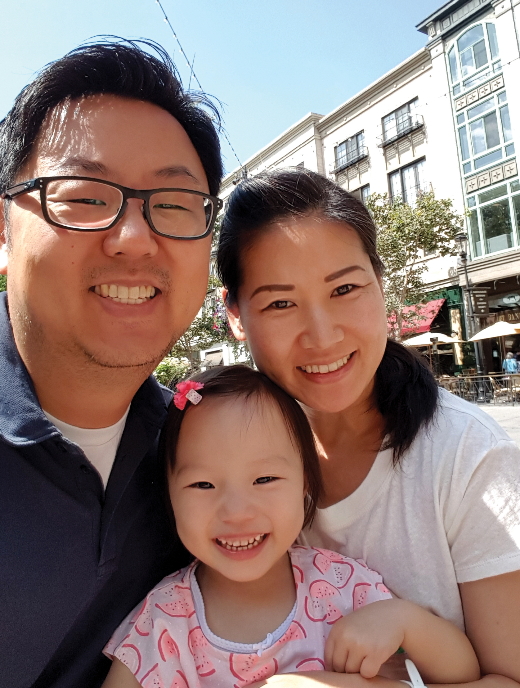 Sophie with her parents. 