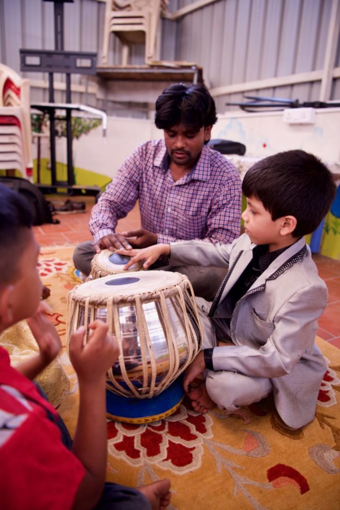 Once a week, some children get the opportunity to take tabla lessons — a traditional instrument that requires a very specific drumming technique.