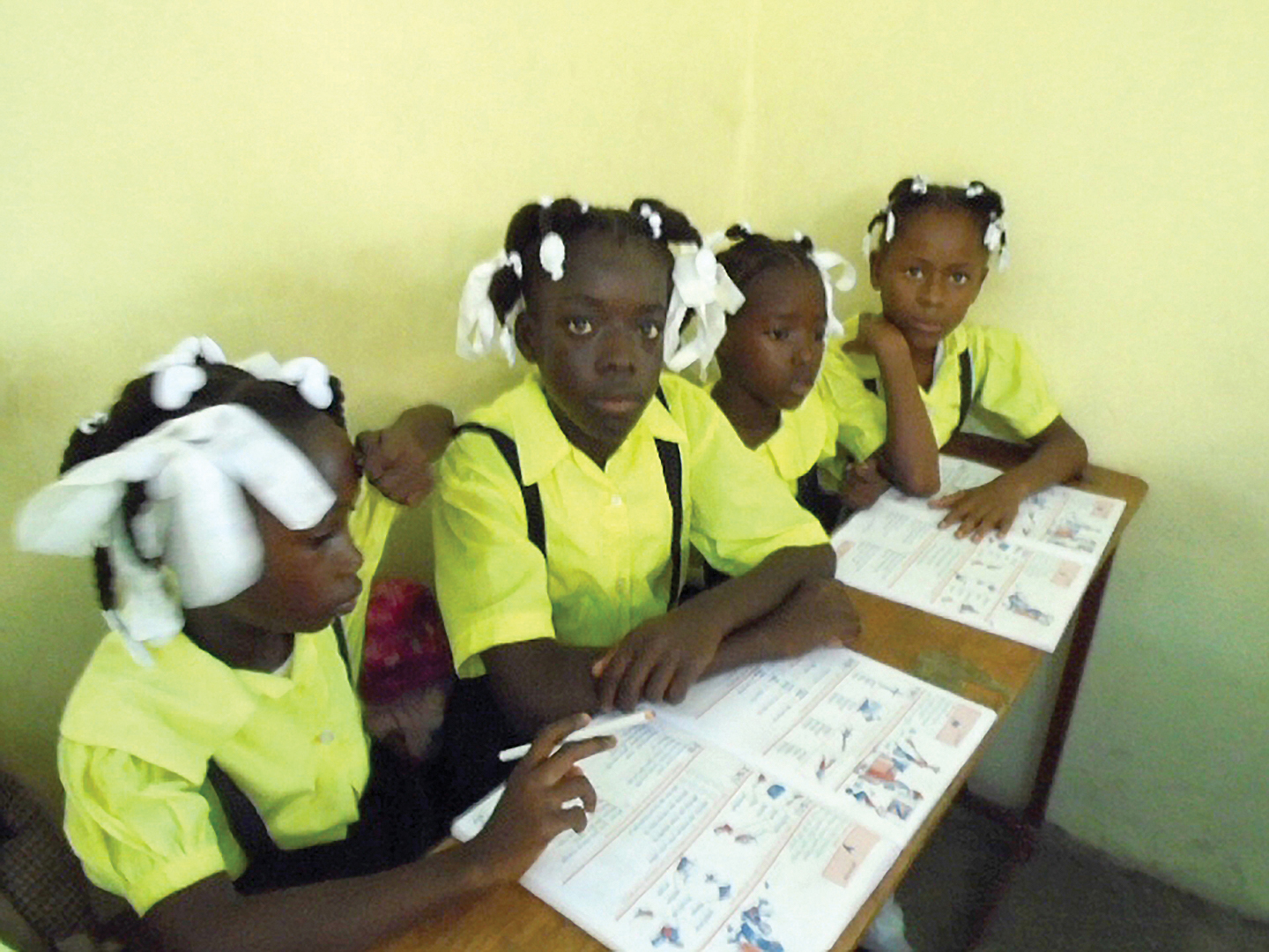 Through sponsorship, children at Fontana Village School receive school uniforms, nutritious meals and school supplies.