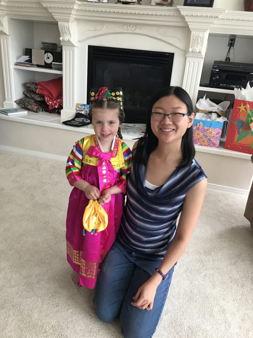 Allison with her niece, Hannah, who is wearing Allison's childhood hanbok.