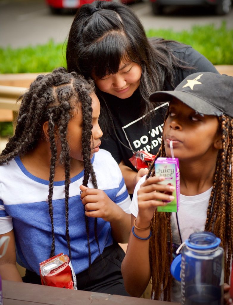 Caitlin (center) with youth Adoptee campers at last year's Holt Adoptee Camp.