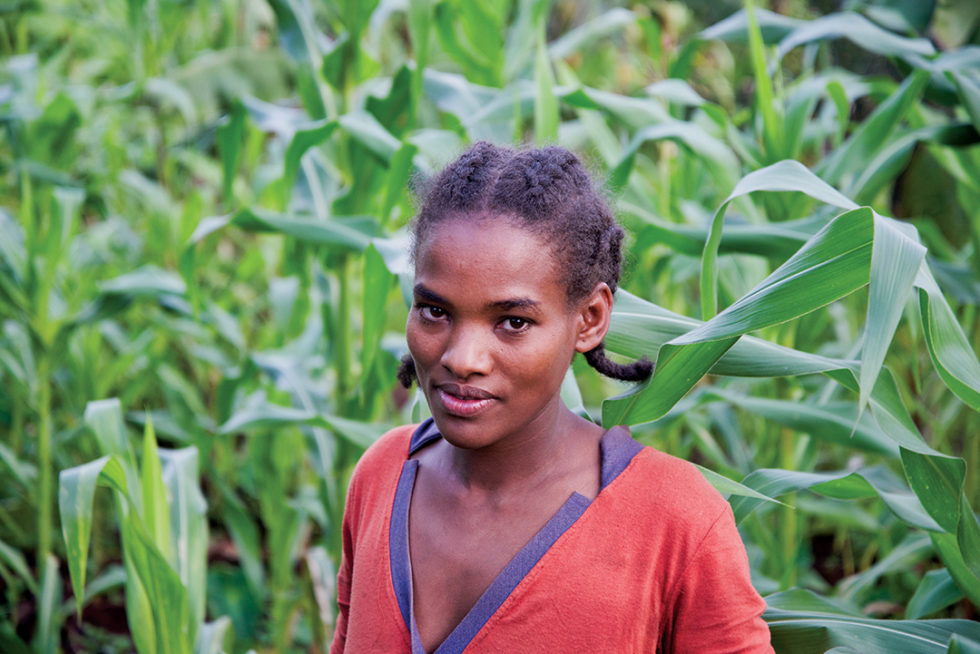 Meselech, 22, received a cow and seedlings to grow her family’s income.
