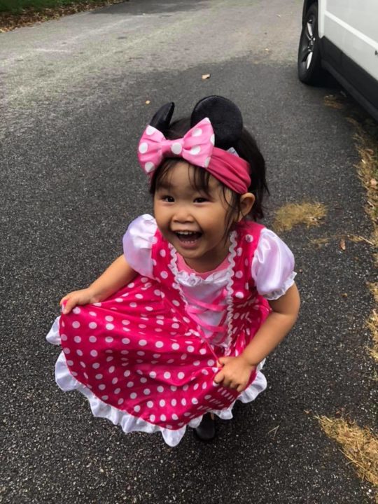 Shelby dressed as Minnie Mouse, now home with her family!