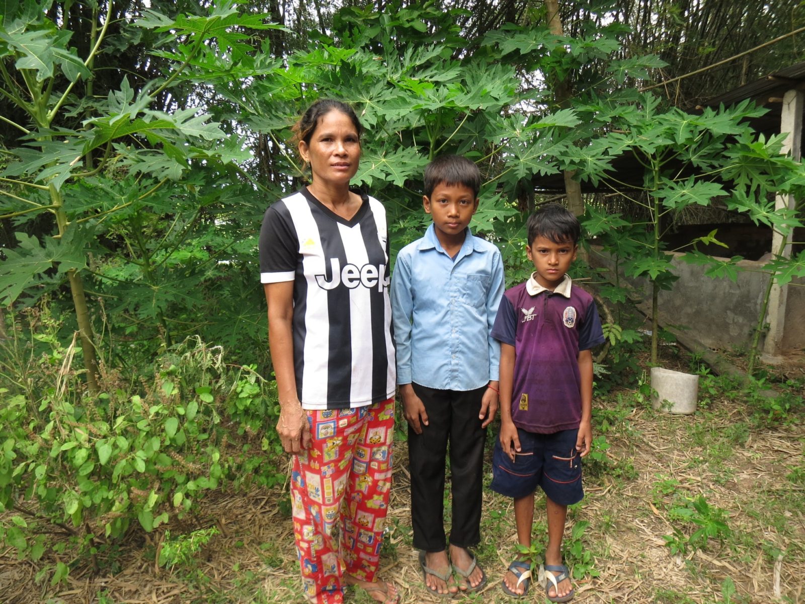 Mol Vey with his mother, Leng Sina, and younger brother.