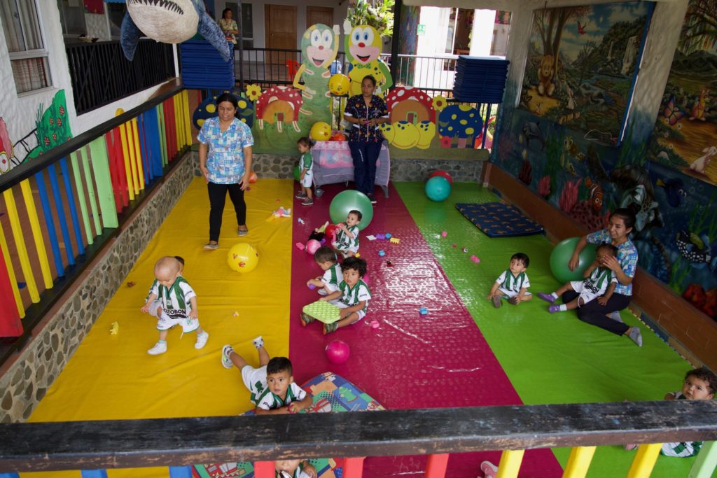 Photos of children at the free daycare at Bambi, one of Holt's local partners in Colombia.