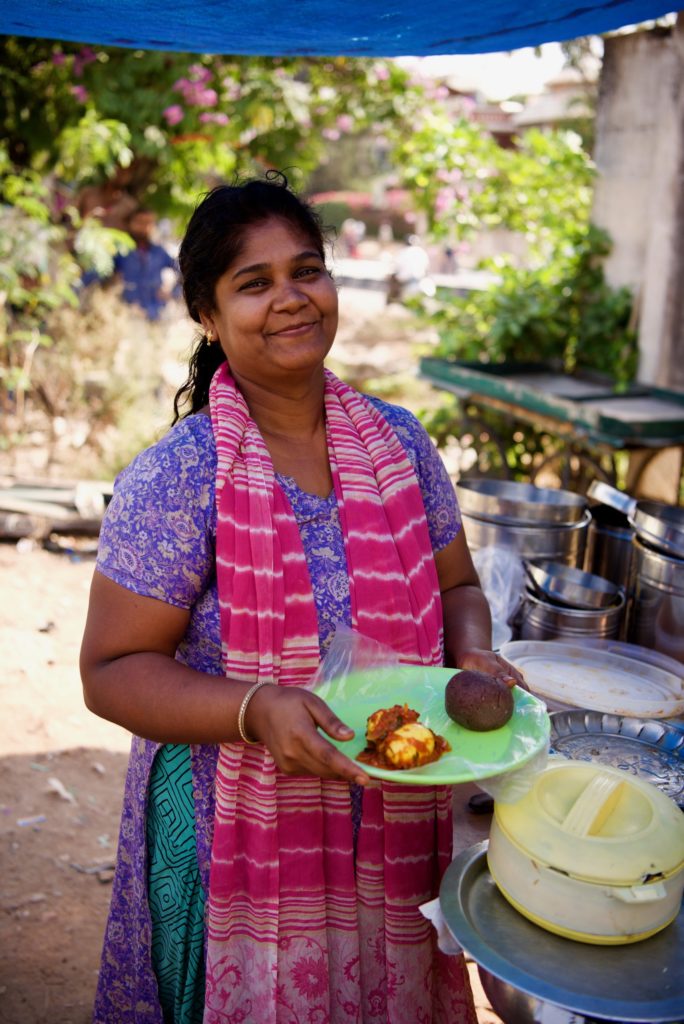 Sheela demonstrating the impact of a gift of hope.