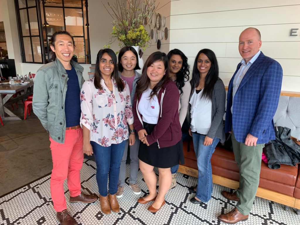 Christina, Deborah, Rekha and Kip meet with some of Holt's post-adoption services team.