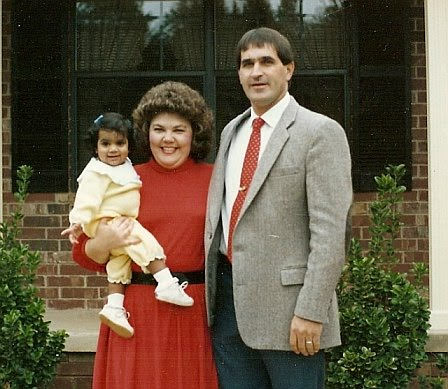 Christina with her mom and dad in March 1989.