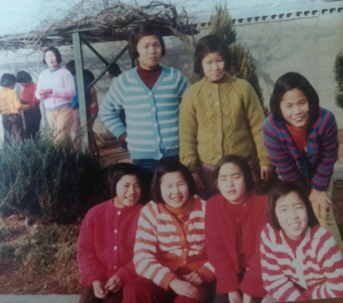 Julie and her sisters at the orphanage, in about 1974.