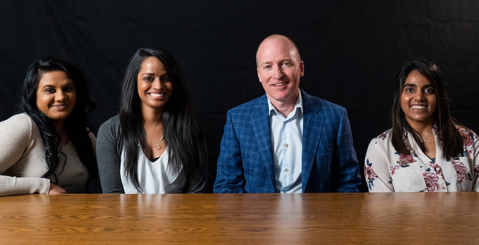 Deborah, Rekha, Kip and Christina connect at Holt International for the first time since they traveled from India to the U.S. together.