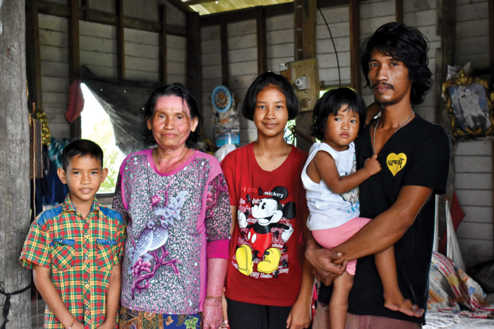 Panit, his mother and older sister — as well as Panit’s adult brother and niece who live next door.