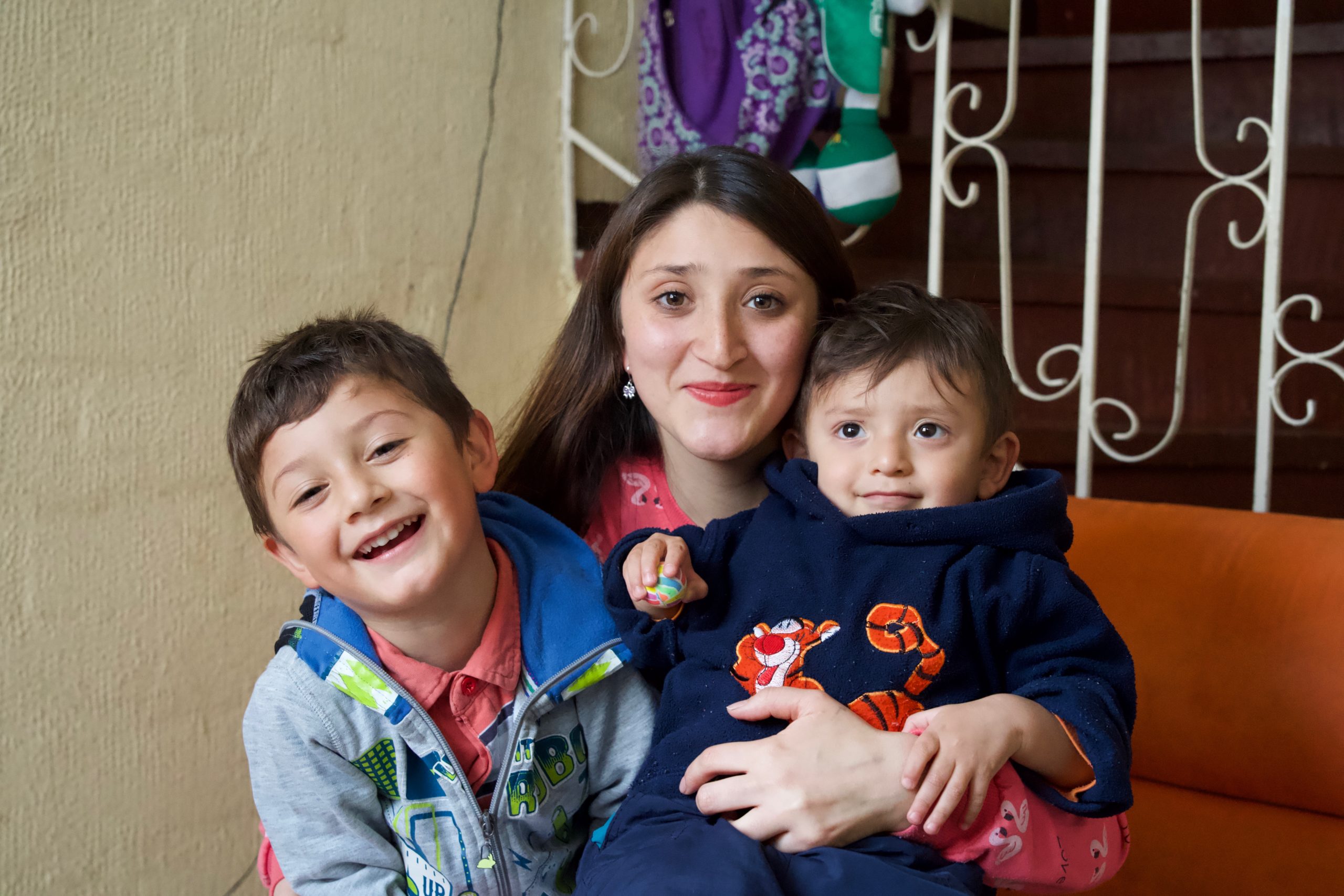 a single mother in Colombia with her two sons